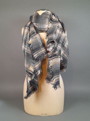 grey and white plaid scarf on a mannequin mannequin mannequin mannequin mannequin mannequin mannequin mannequin mann