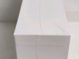 a close up of a piece of white wood on the floor