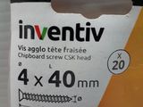 a package of screws in a package on a table