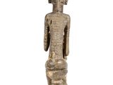 an image of a statue of a man with a hat on his head