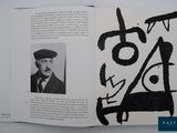 a book with a picture of a man in a hat and a picture of a man in a suit