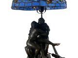 an image of a table lamp with a blue shade on it