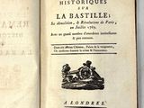 un livre ouvert sur lequel est posée l'image d'un homme à cheval