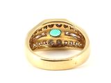 an image of a gold ring with a turquoise stone surrounded by diamonds