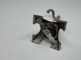 a small metal object that is sitting on a table