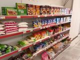 a lot of food on the shelves in the store
