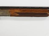 rifle mounted on a wall with a key in it