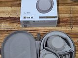 the sony headphones are sitting in a case on the table