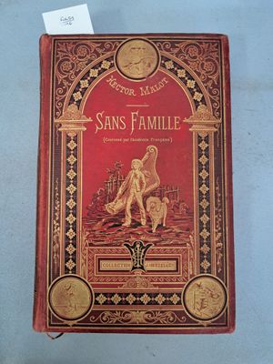 the front cover of a red book with gold trimming and a picture of an angel on it