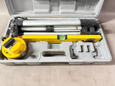 a close up of a tool in a case with tools inside of it