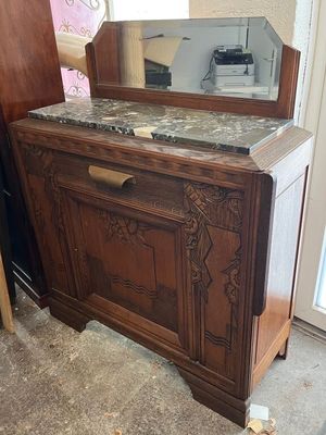 Buffet en chêne sculpté de coquillages et motifs géométrique…