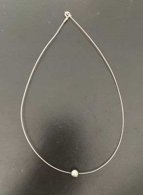 Collier câble en acier orné d'une perle de Tahiti