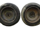 pair of old tires on a white background with a white background