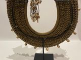 an image of a decorative piece of art on display on a stand
