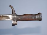 a close up of a knife on a table