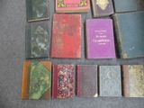 many books that are sitting on the floor together