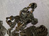 a lot of metal items that are laying on a table