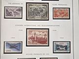 a picture of a collection of stamps on a table