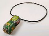 a picture of a necklace made out of tin cans
