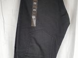 the pants are black and have brown buttons on them