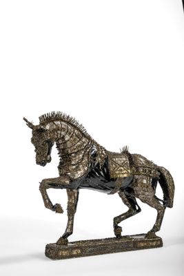 a statue of a horse that is standing on its hind legs
