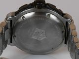 an image of a close up of a watch on a white surface