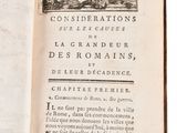 an open book with a black and white image of a man riding a horse