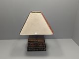 an image of a lamp that is on top of a table