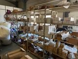 a large amount of boxes on the shelves in the warehouse