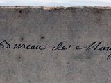 a piece of paper with writing on it sitting on a table