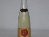 a bottle of wine that is sitting on a table