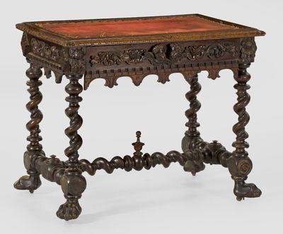 an old wooden table with a red top on a white background