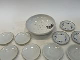 a lot of plates that are sitting on a table