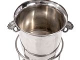 a silver pot on a stand on a white background