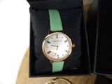 a watch that is sitting in a box on a table