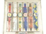 a clear box with a bunch of watches inside of it