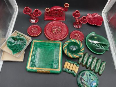 a lot of green and red items sitting on a table