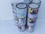 several cans of paint are stacked on top of each other