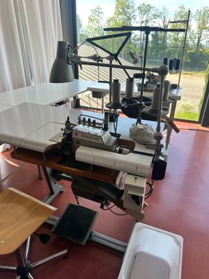 a sewing machine sitting on a table in a room