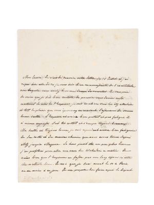 une lettre écrite à l'encre noire sur une feuille de papier