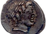 une pièce d'argent portant l'image d'une tête de femme