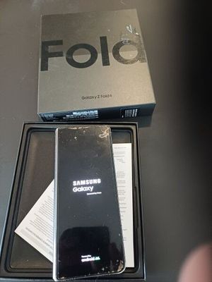 a box with a phone inside of it sitting on a table