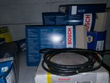 a box with a hose on top of it next to a box with a hose