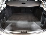 a trunk of a car with the back seats folded down