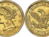 a close up of a gold coin with an eagle on it