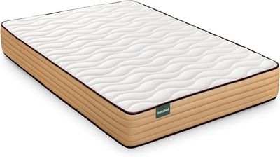 gros plan d'un matelas sur une surface blanche