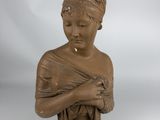 statue of a woman holding a baby in her arms