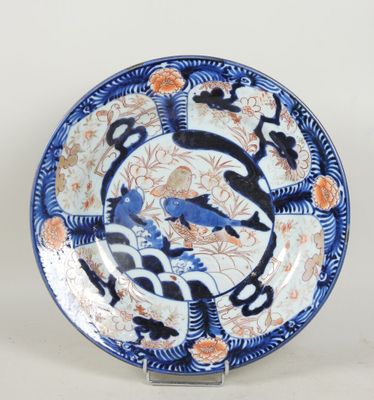 an image of a blue and white plate with birds and flowers on it