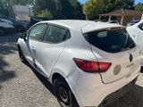 a picture of a white car parked in a parking lot