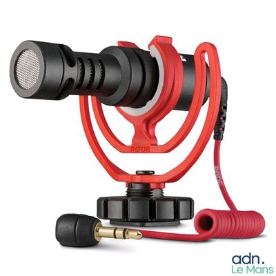 a red microphone with a red cord attached to it